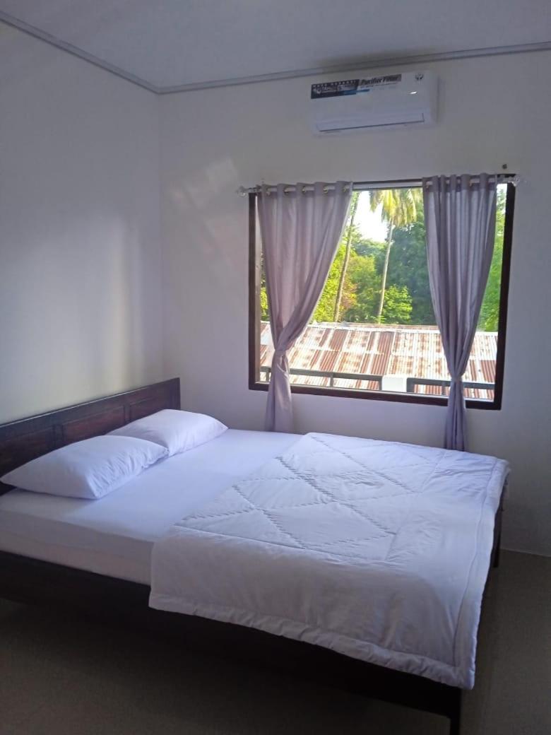 Riung Tiga Empat Tujuh Guesthouse Exterior foto